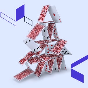 A stack of playing cards on an IBM i2 background.